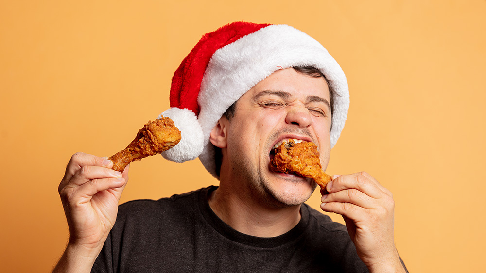 Santa Claus eating chicken